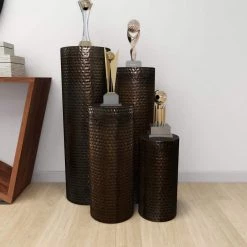 Brown Metal Pillar Style Pedestal Table with Hammered Design (Set of 4) by Litton Lane -Outlet Litton Lane Store brown litton lane coffee tables 22024 44 1000