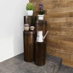 Brown Metal Pillar Style Pedestal Table with Hammered Design (Set of 4) by Litton Lane -Outlet Litton Lane Store brown litton lane coffee tables 22024 4f 1000